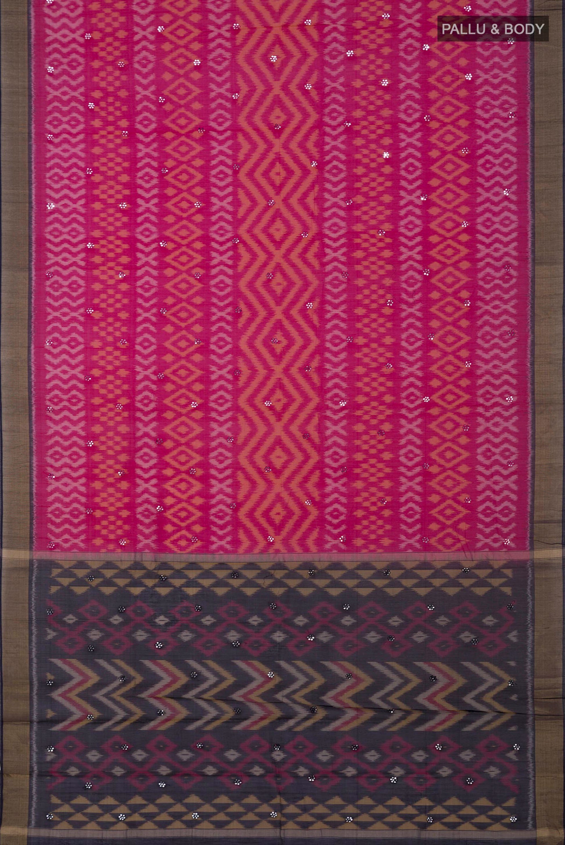 Flat view of Pink Silk Cotton Saree with Ikat design on the body and Zari Border. 