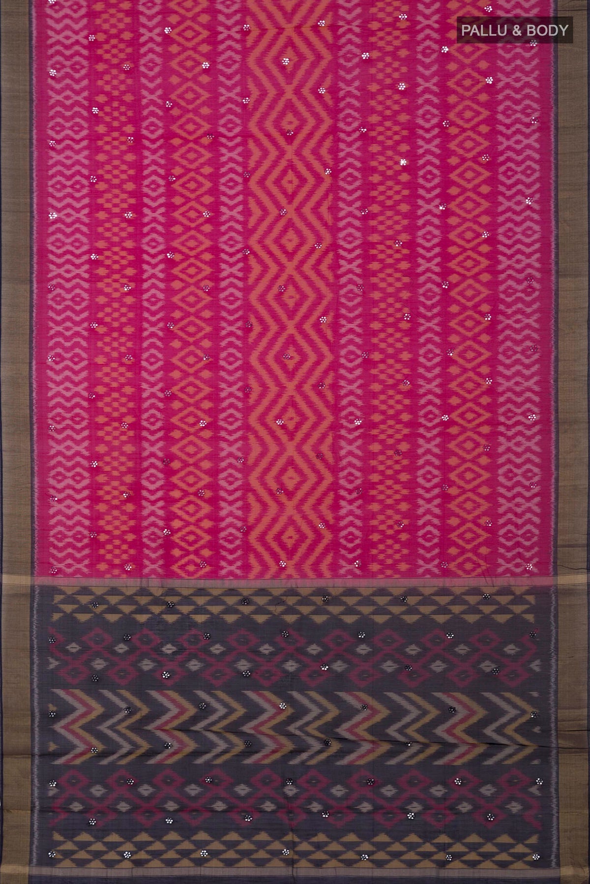 Flat view of Pink Silk Cotton Saree with Ikat design on the body and Zari Border. 