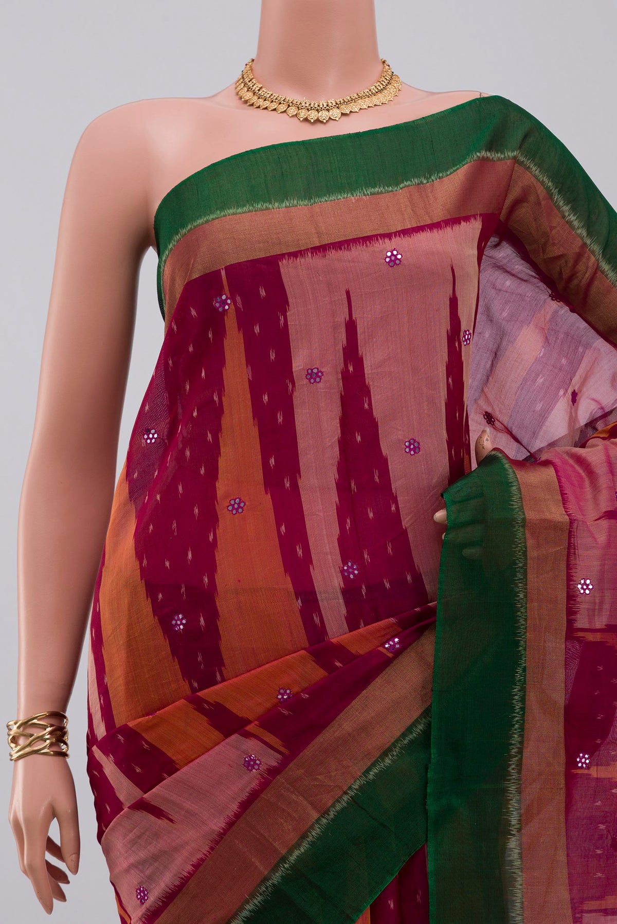 Border image of Pink Silk Cotton Saree with Ikat Print on the body and Zari Border. 