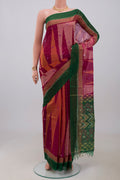 Pink Silk Cotton Saree with Ikat Print on the body and Zari Border.  displayed on a mannequin