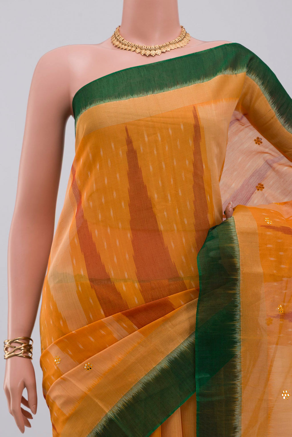 Border image of Yellow Silk Cotton Saree with Ikat Print on the body and Paithani Border. 