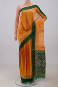 Yellow Silk Cotton Saree with Ikat Print on the body and Paithani Border.  displayed on a mannequin