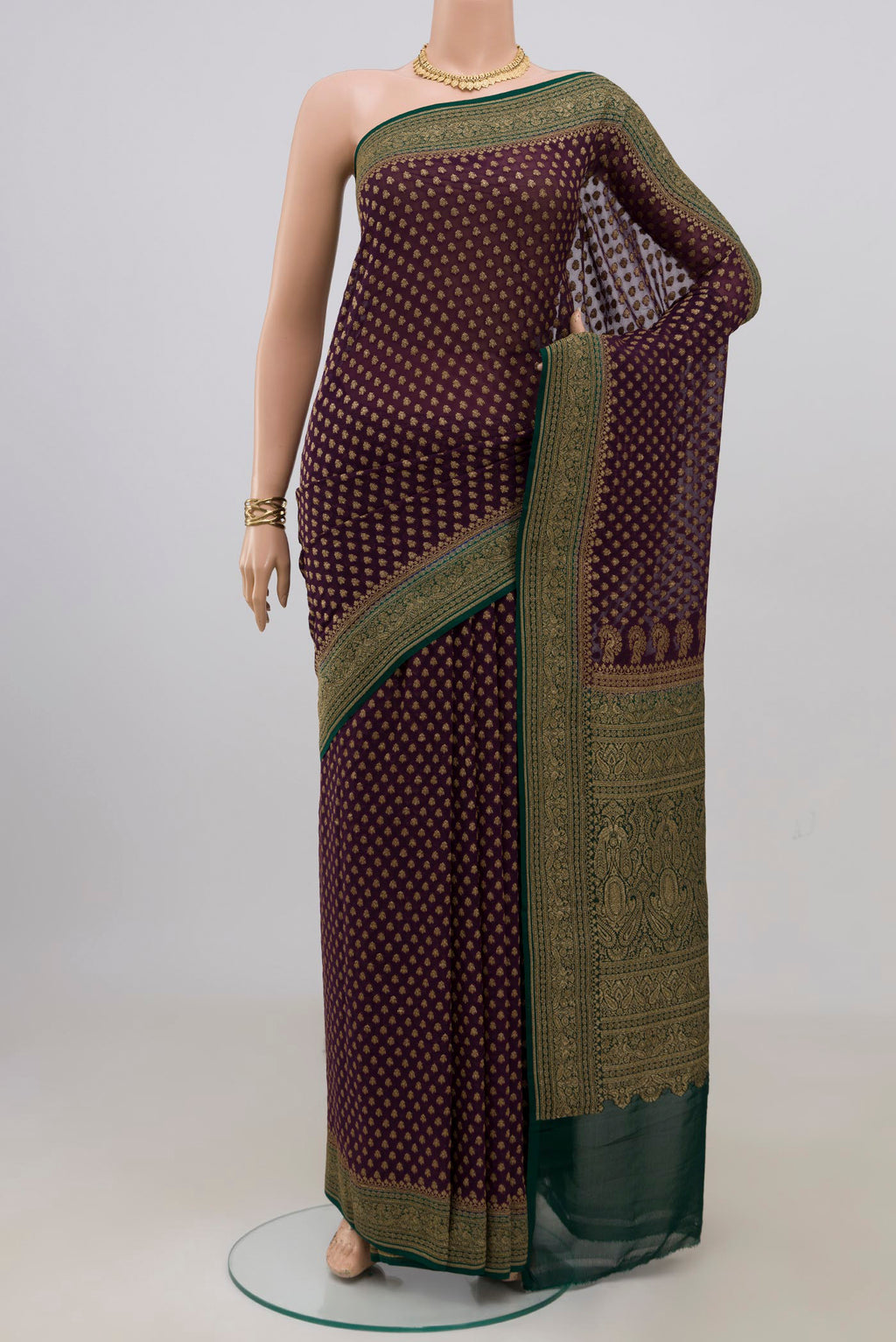 Purple Banarasi Georgette Saree with Zari Butta on the body and Zari Border.  displayed on a mannequin