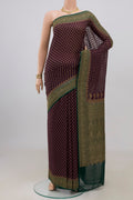Purple Banarasi Georgette Saree with Zari Butta on the body and Zari Border.  displayed on a mannequin