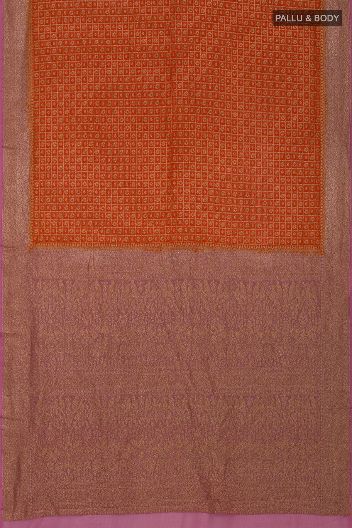 Flat view of Orange Georgette Saree with Fancy on the body and Zari Border. 