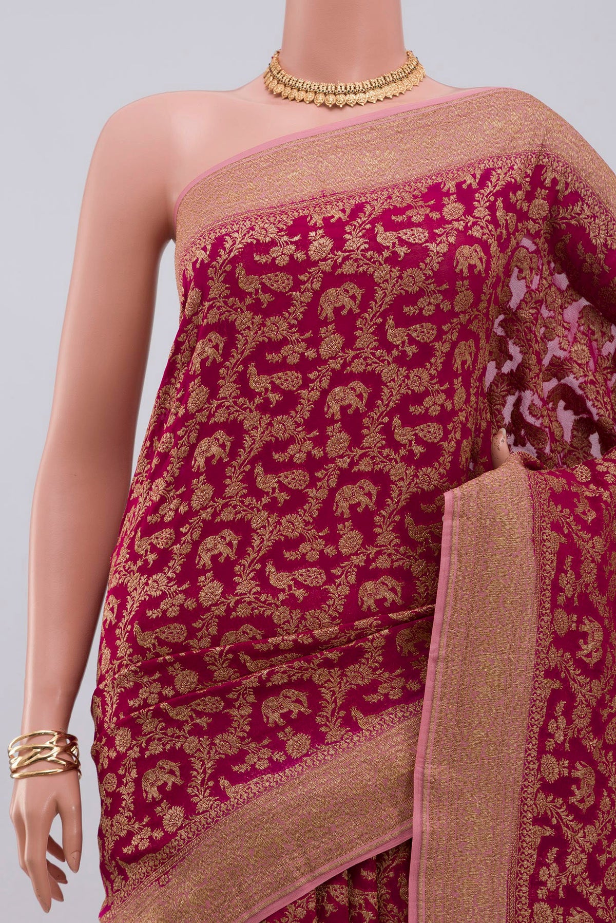 Border image of Pink Georgette Saree with Fancy on the body and Zari Border. 