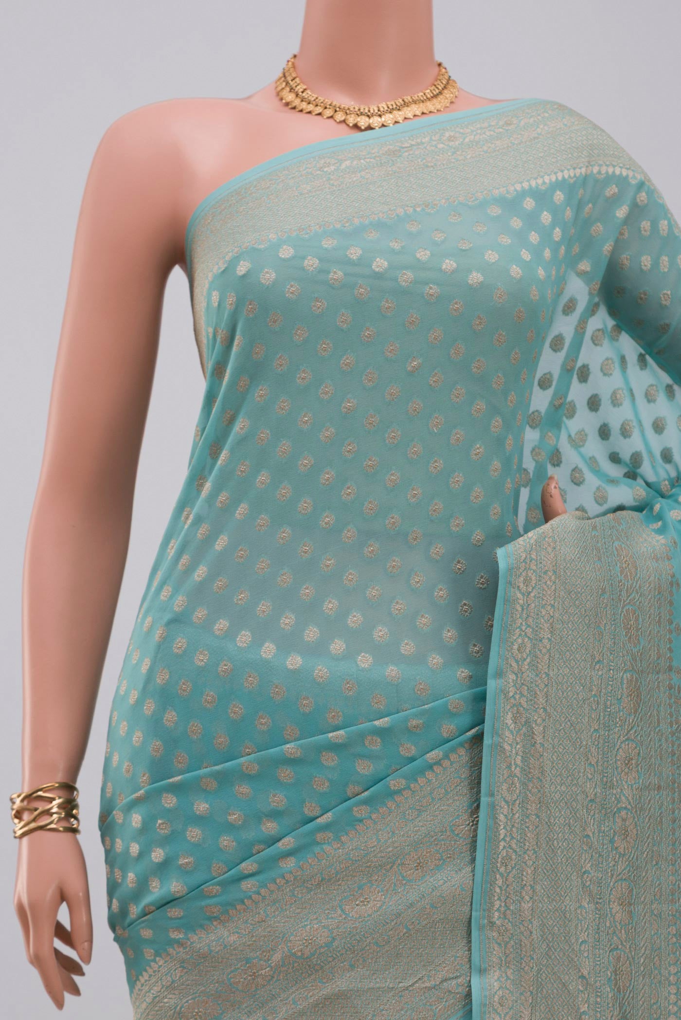 Border image of Blue Georgette Saree with Fancy on the body and Fancy Border. 