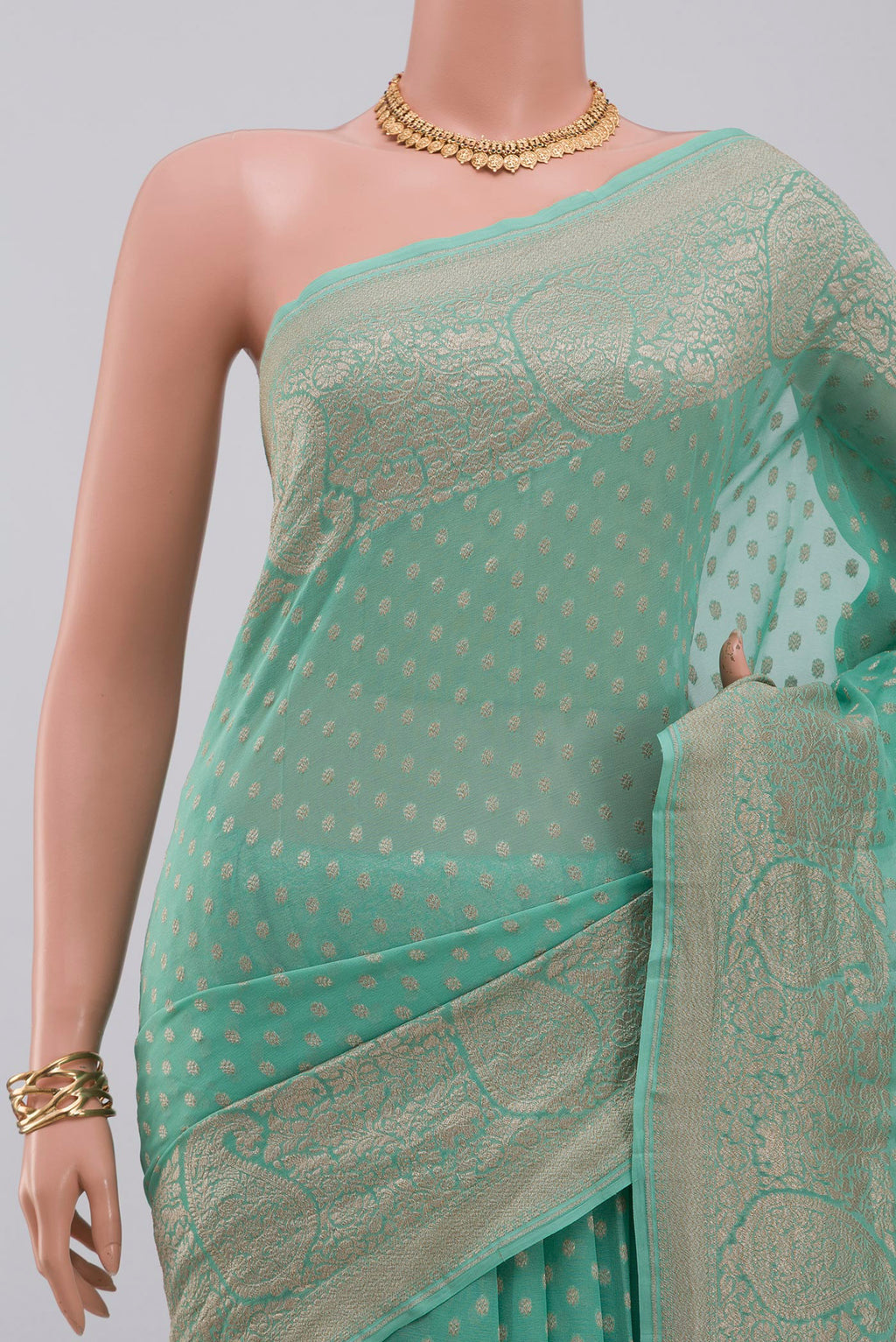 Border image of Blue Georgette Saree with Fancy on the body and Fancy Border. 