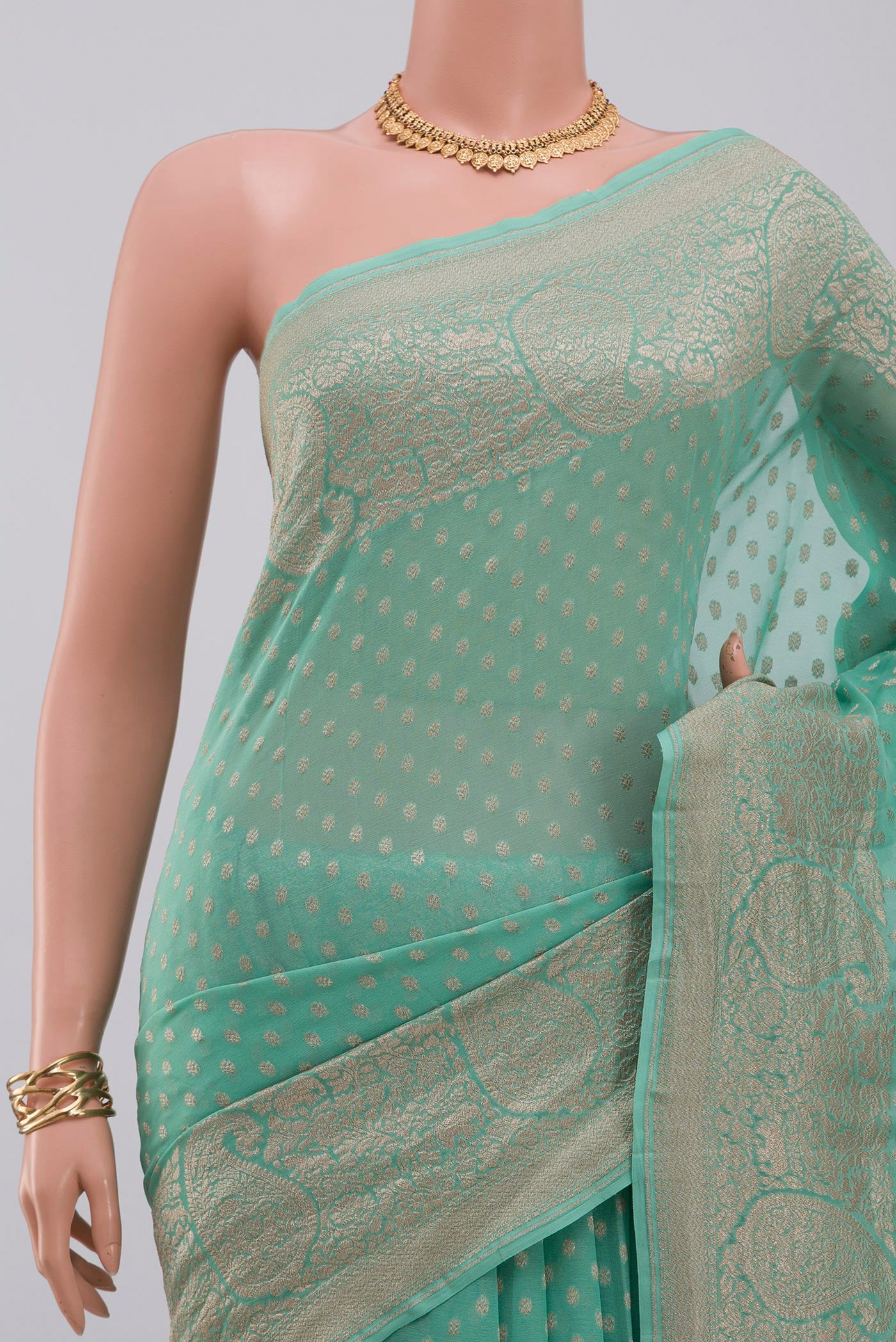 Border image of Blue Georgette Saree with Fancy on the body and Fancy Border. 