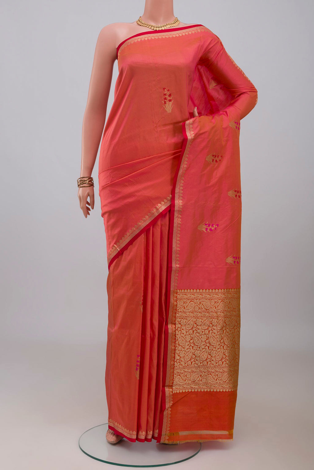 Pink Banarasi Katan Silk Saree with Zari Butta on the body and Zari Border.  displayed on a mannequin