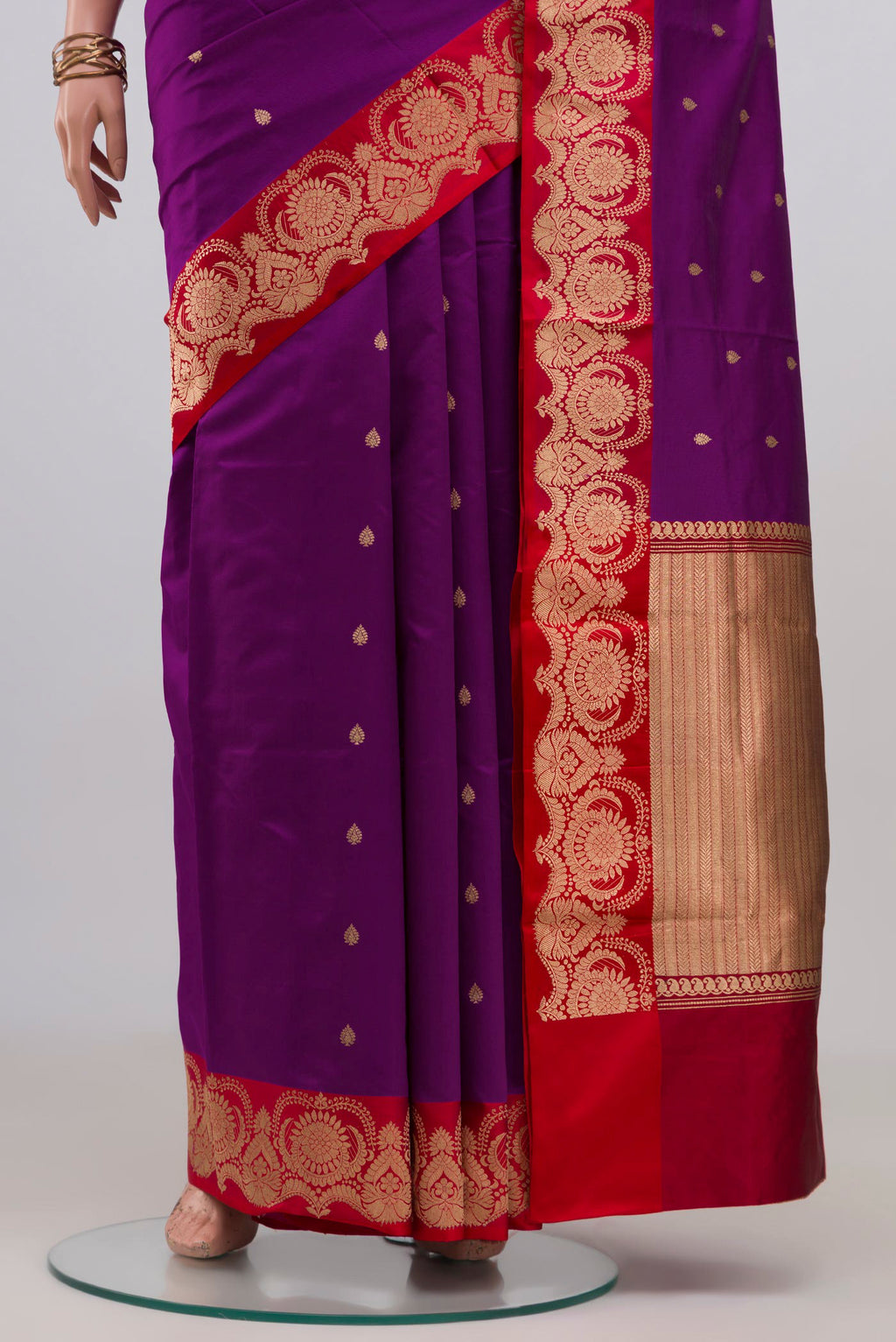 Pleats and pallu of Purple Banarasi Katan Silk Saree with Zari Butta on the body and Fancy Border. 