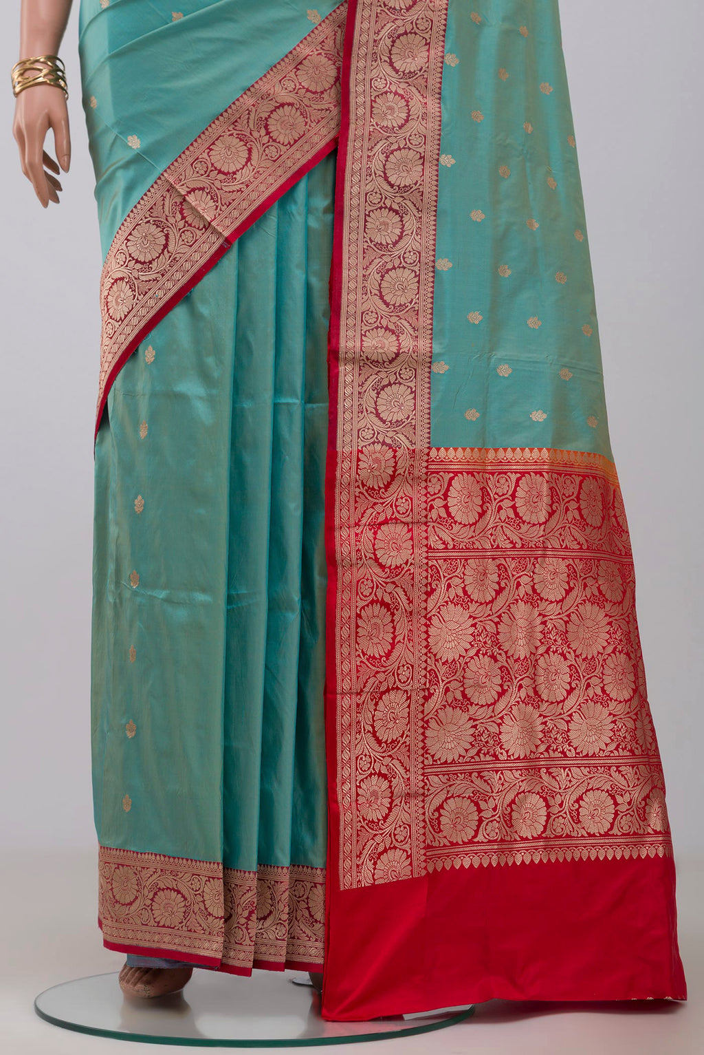 Pleats and pallu of Blue Banarasi Katan Silk Saree with Zari Butta on the body and Zari Border. 