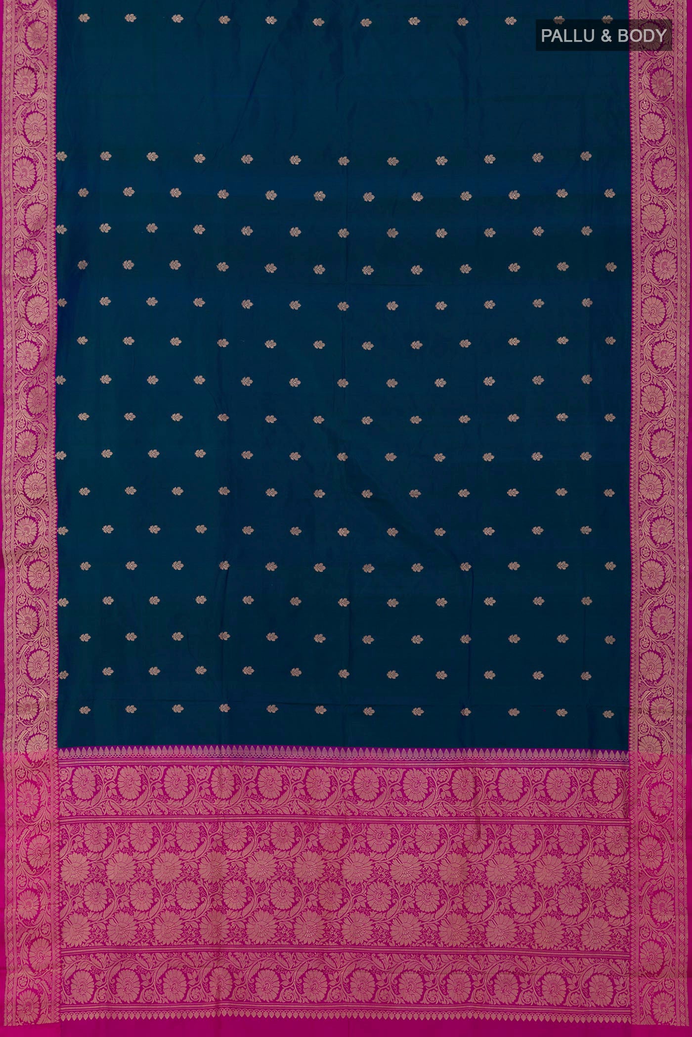 Flat view of Blue Banarasi Katan Silk Saree with Zari Butta on the body and Fancy Border. 