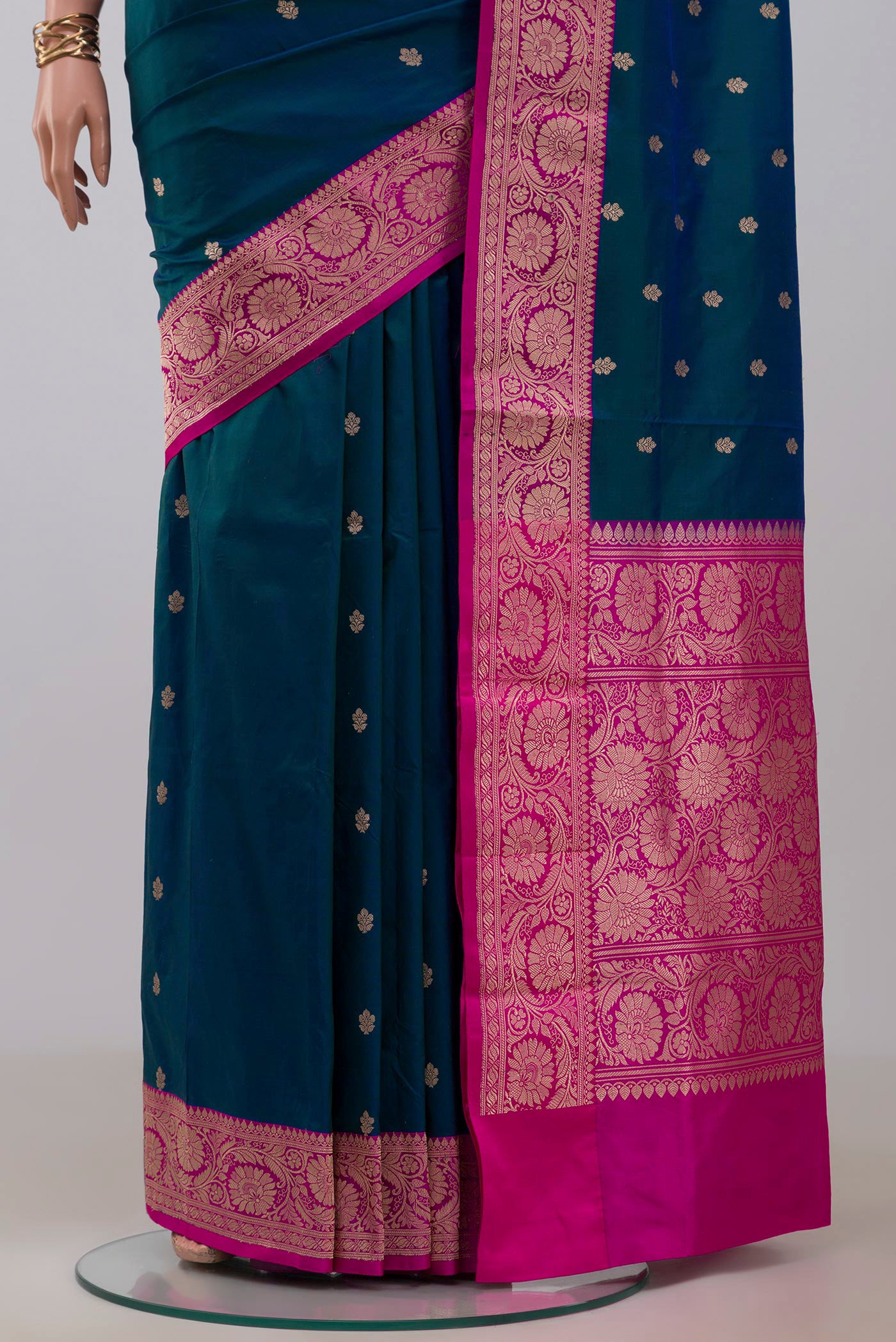 Pleats and pallu of Blue Banarasi Katan Silk Saree with Zari Butta on the body and Fancy Border. 