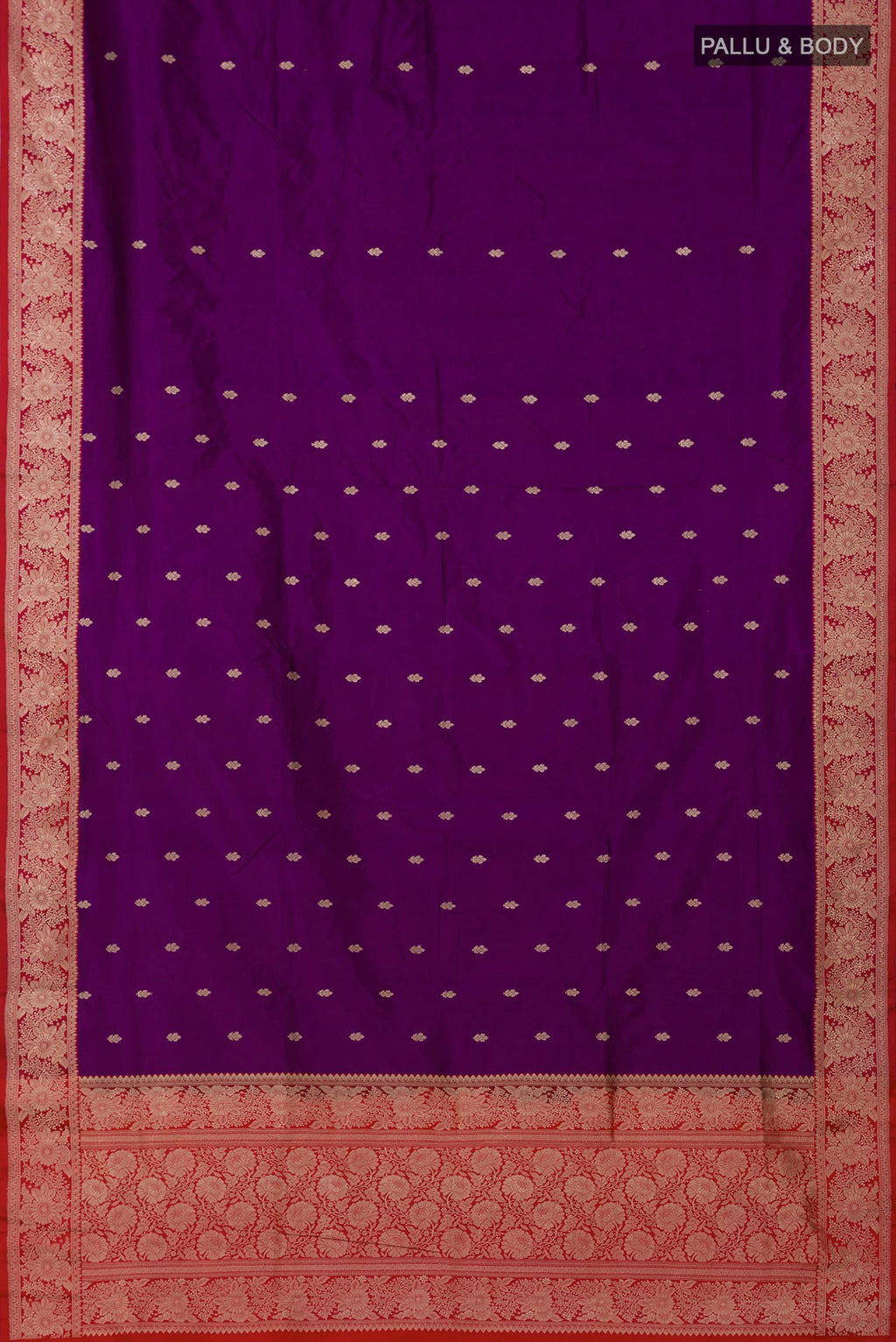 Flat view of Purple Banarasi Katan Silk Saree with Zari Butta on the body and Fancy Border. 