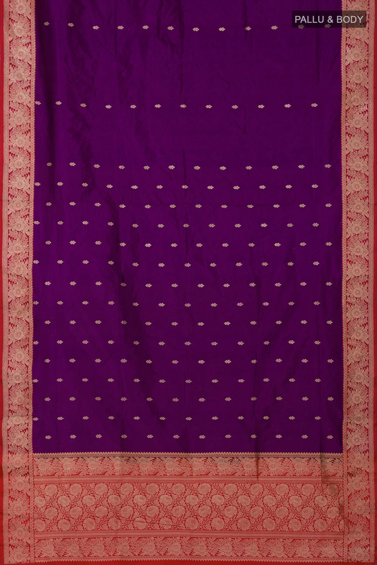 Flat view of Purple Banarasi Katan Silk Saree with Zari Butta on the body and Fancy Border. 