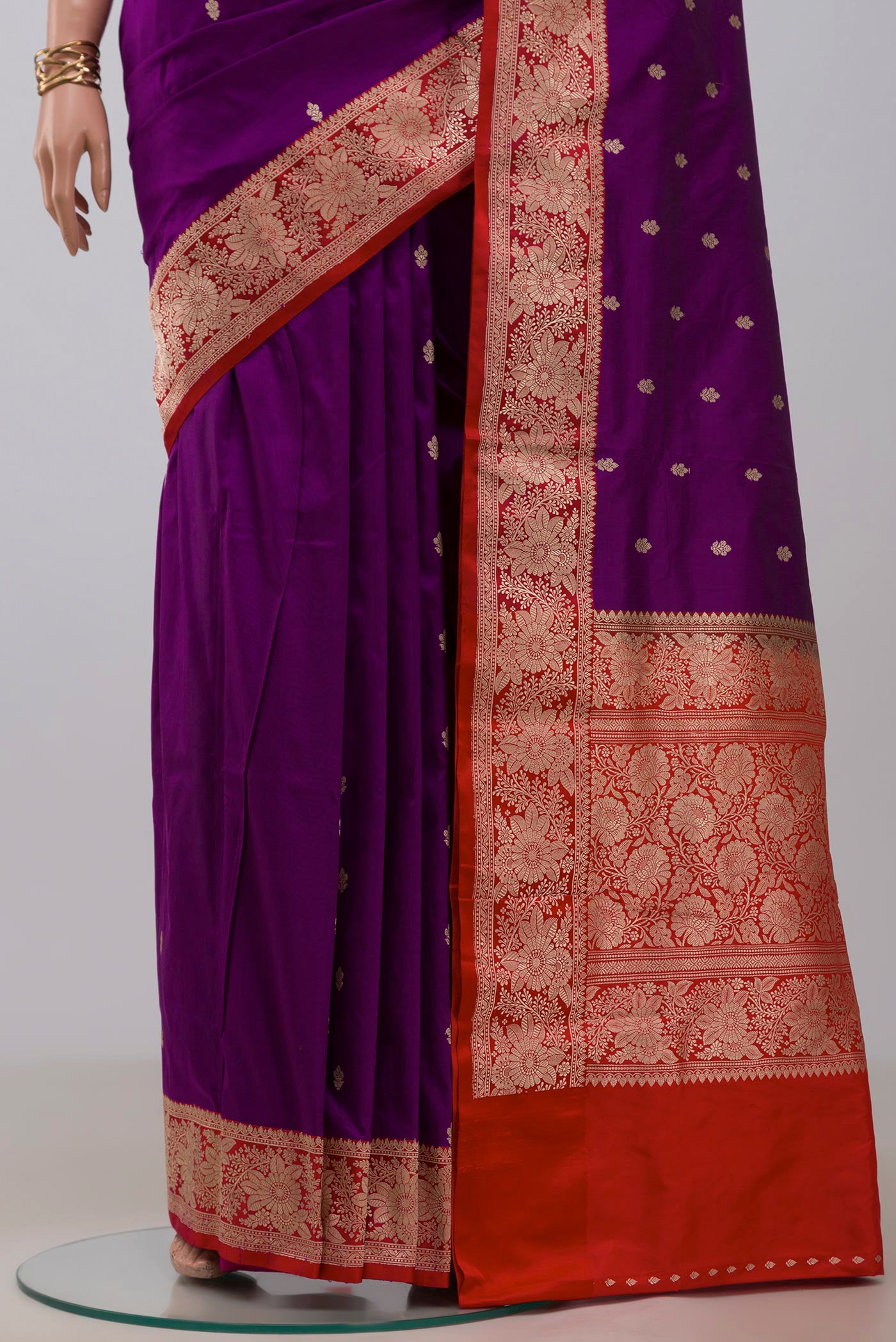 Pleats and pallu of Purple Banarasi Katan Silk Saree with Zari Butta on the body and Fancy Border. 
