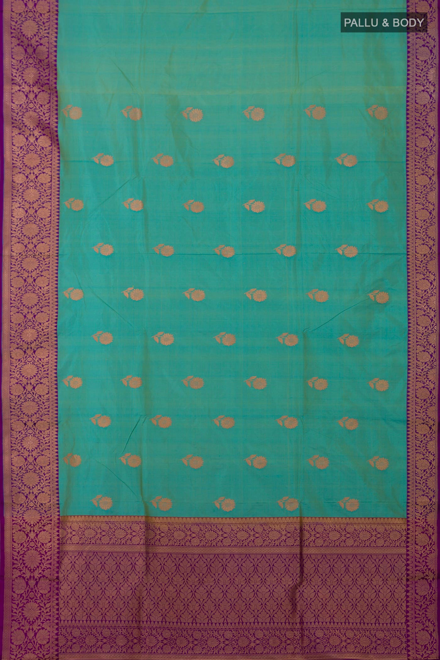 Flat view of Sky Blue Banarasi Katan Silk Saree with Zari Butta on the body and Fancy Border. 