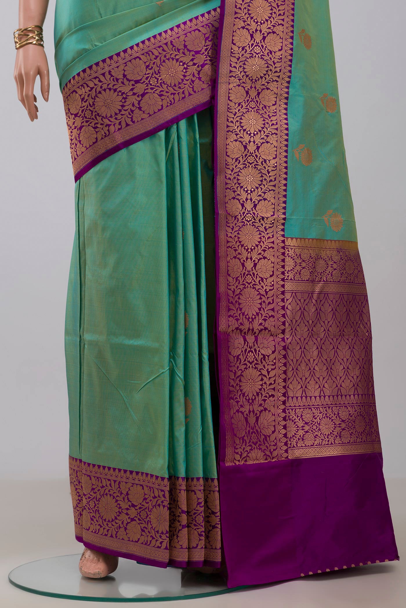 Pleats and pallu of Sky Blue Banarasi Katan Silk Saree with Zari Butta on the body and Fancy Border. 