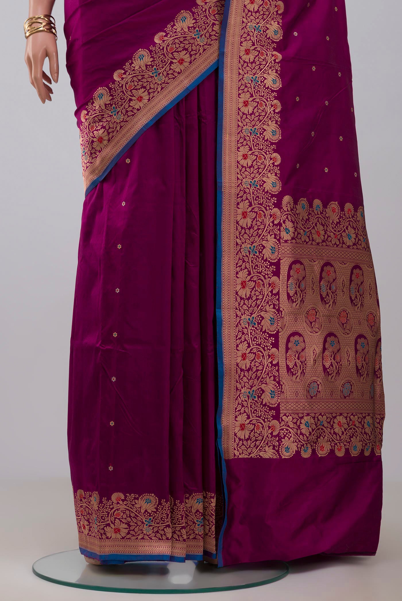 Pleats and pallu of Purple Banarasi Katan Silk Saree with Zari Butta on the body and Fancy Border. 