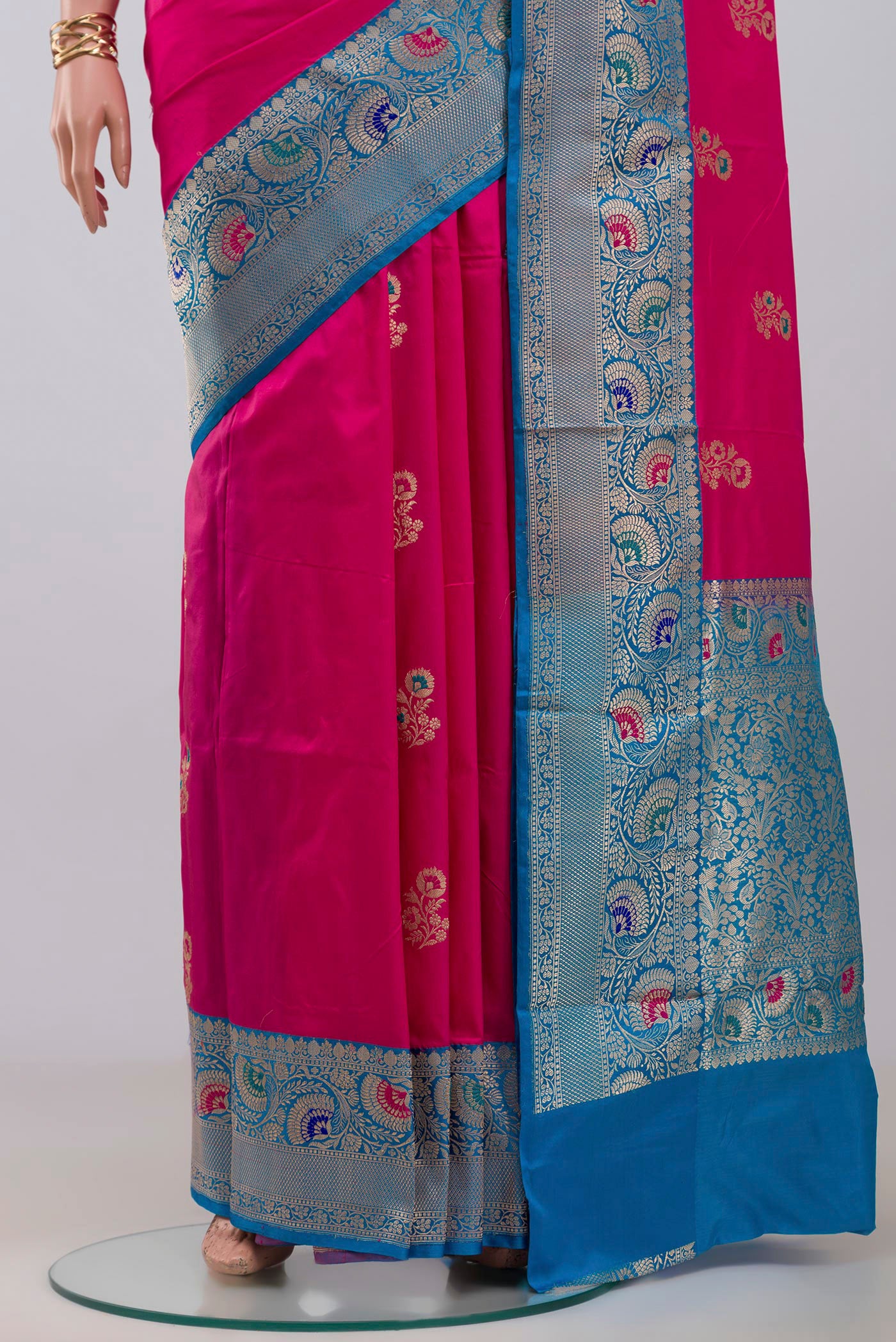 Pleats and pallu of Pink Banarasi Katan Silk Saree with Zari Butta on the body and Fancy Border. 