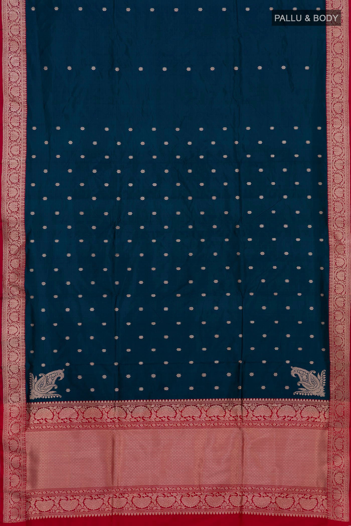 Flat view of Blue Banarasi Katan Silk Saree with Zari Butta on the body and Zari Border. 