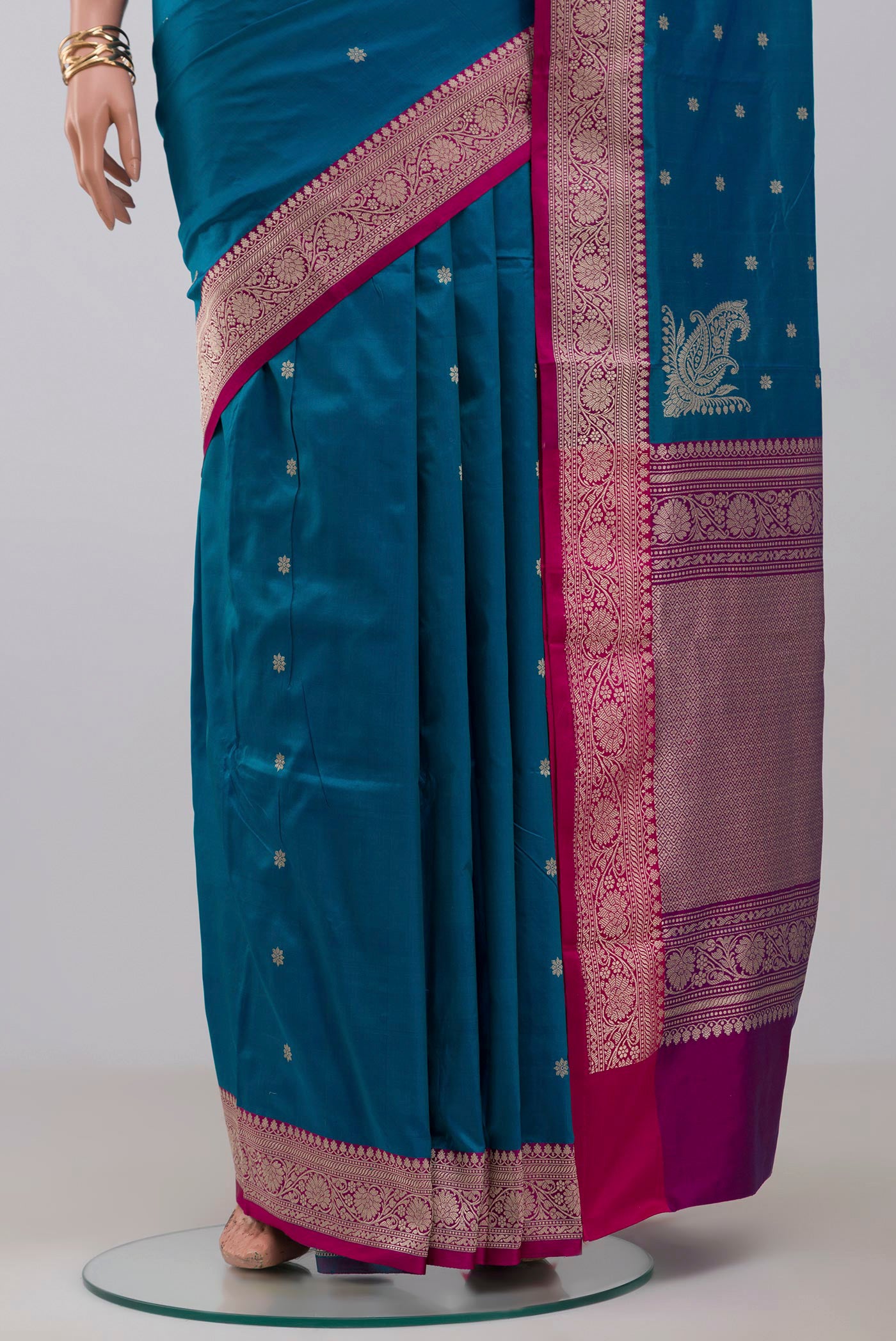 Pleats and pallu of Blue Banarasi Katan Silk Saree with Zari Butta on the body and Fancy Border. 