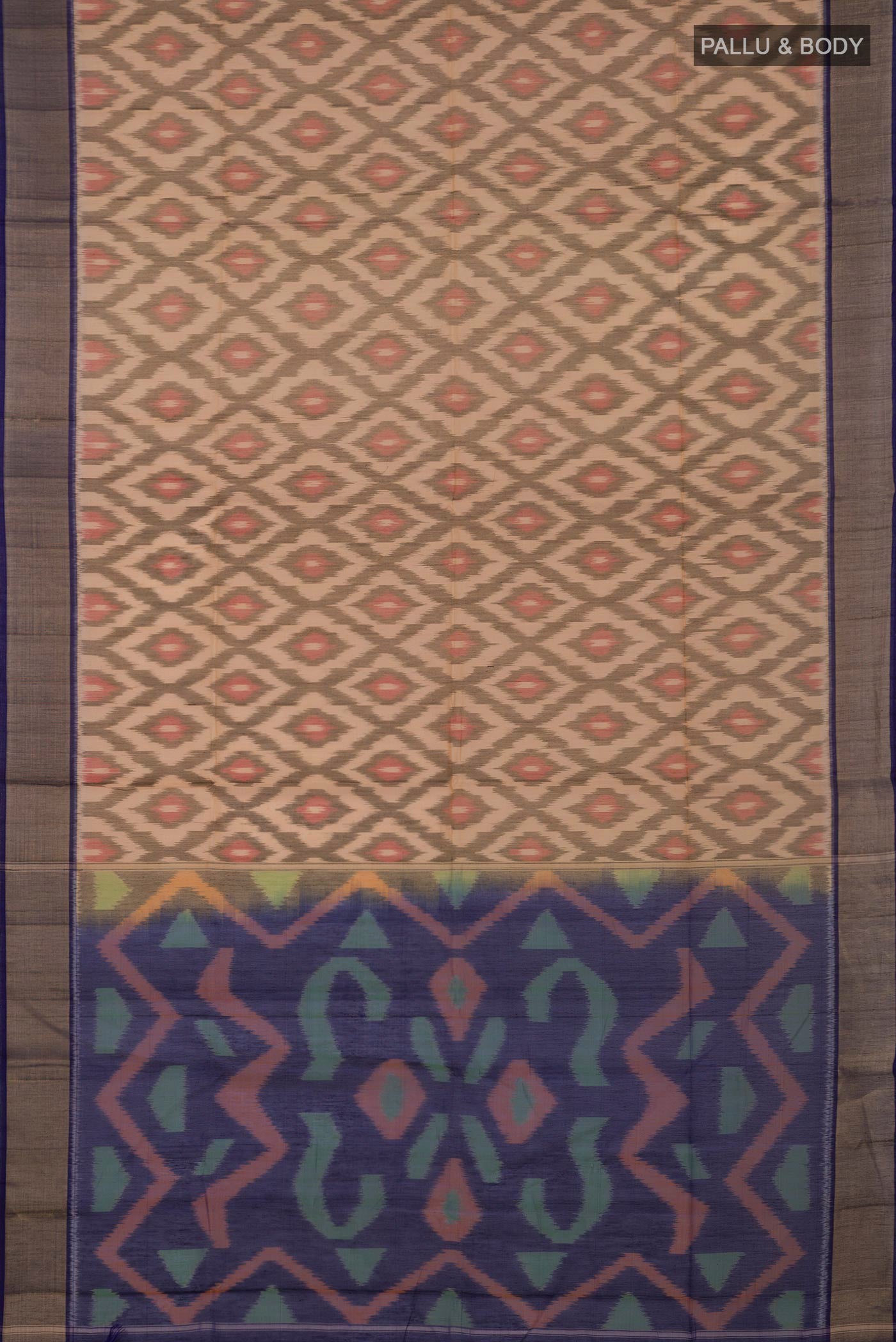 Flat view of Cream Silk Cotton Saree with Ikat Print on the body and Zari Border. 
