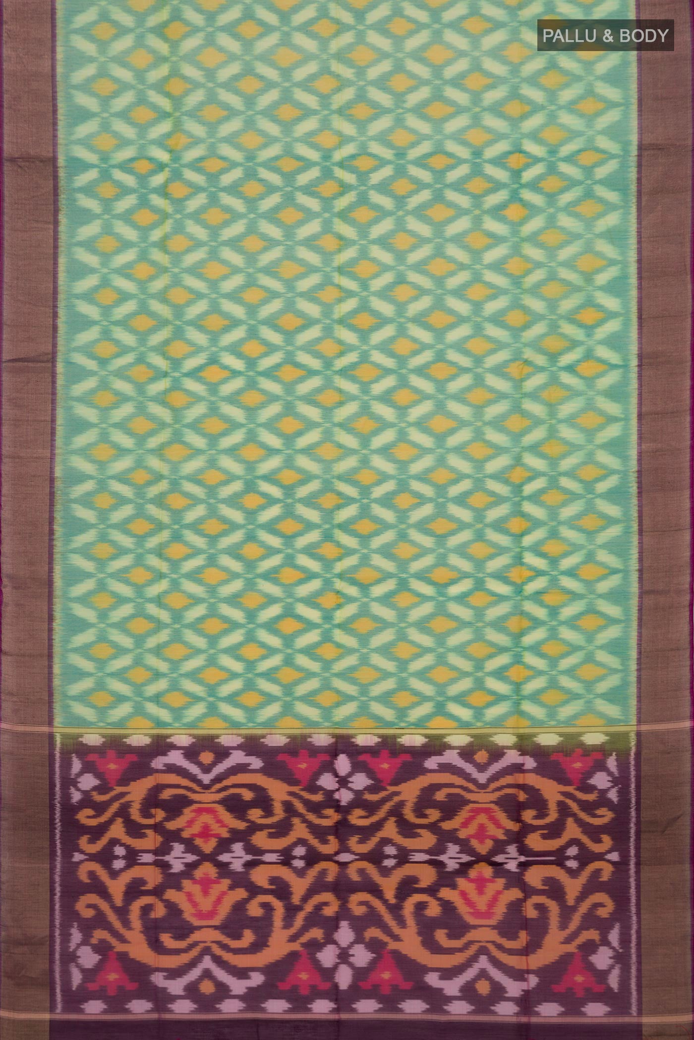 Flat view of Light Green Silk Cotton Saree with Ikat design on the body and Zari Border. 