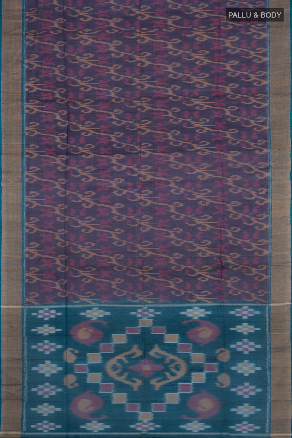 Flat view of Navy Blue Silk Cotton Saree with Ikat design on the body and Zari Border. 