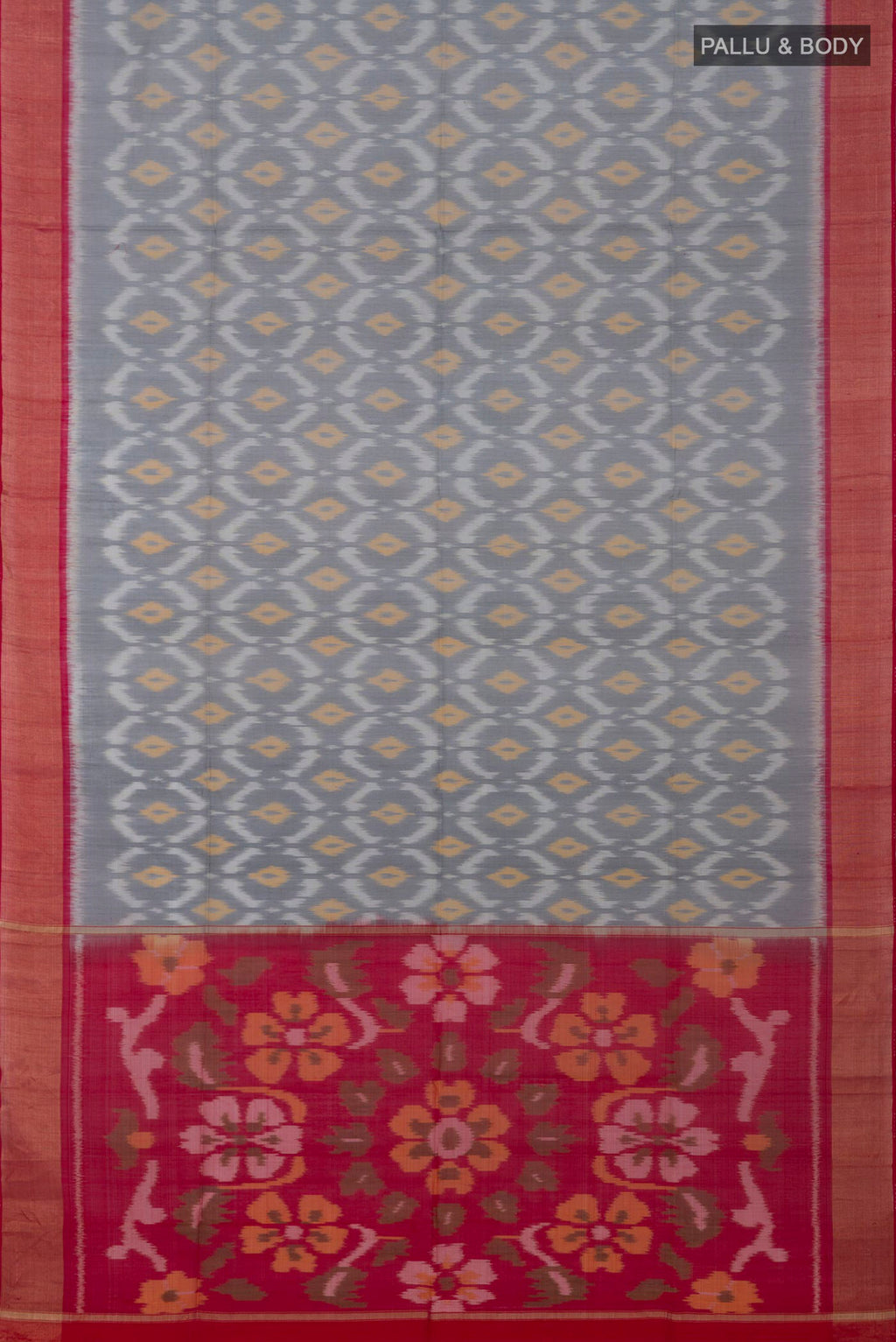 Flat view of Grey Coimbatore Silk Cotton Saree with Ikat design on the body and Zari Border. 