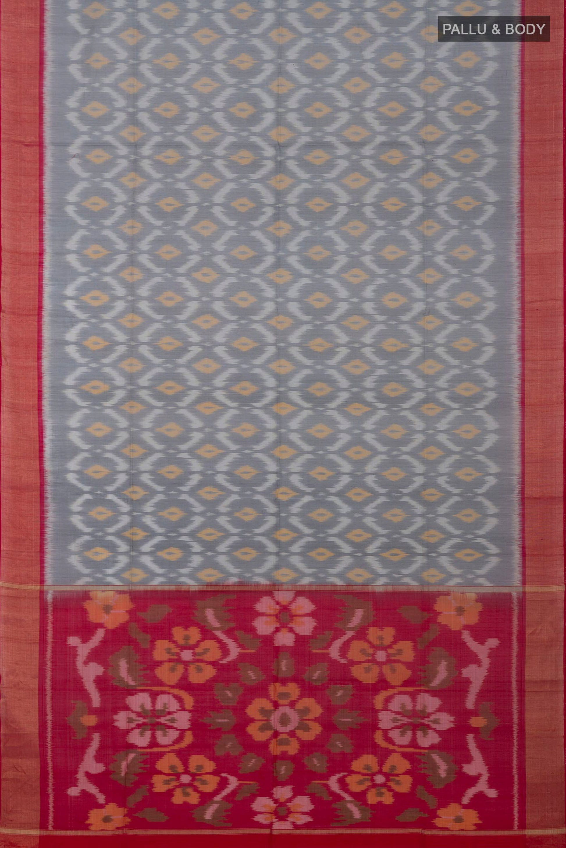 Flat view of Grey Coimbatore Silk Cotton Saree with Ikat design on the body and Zari Border. 