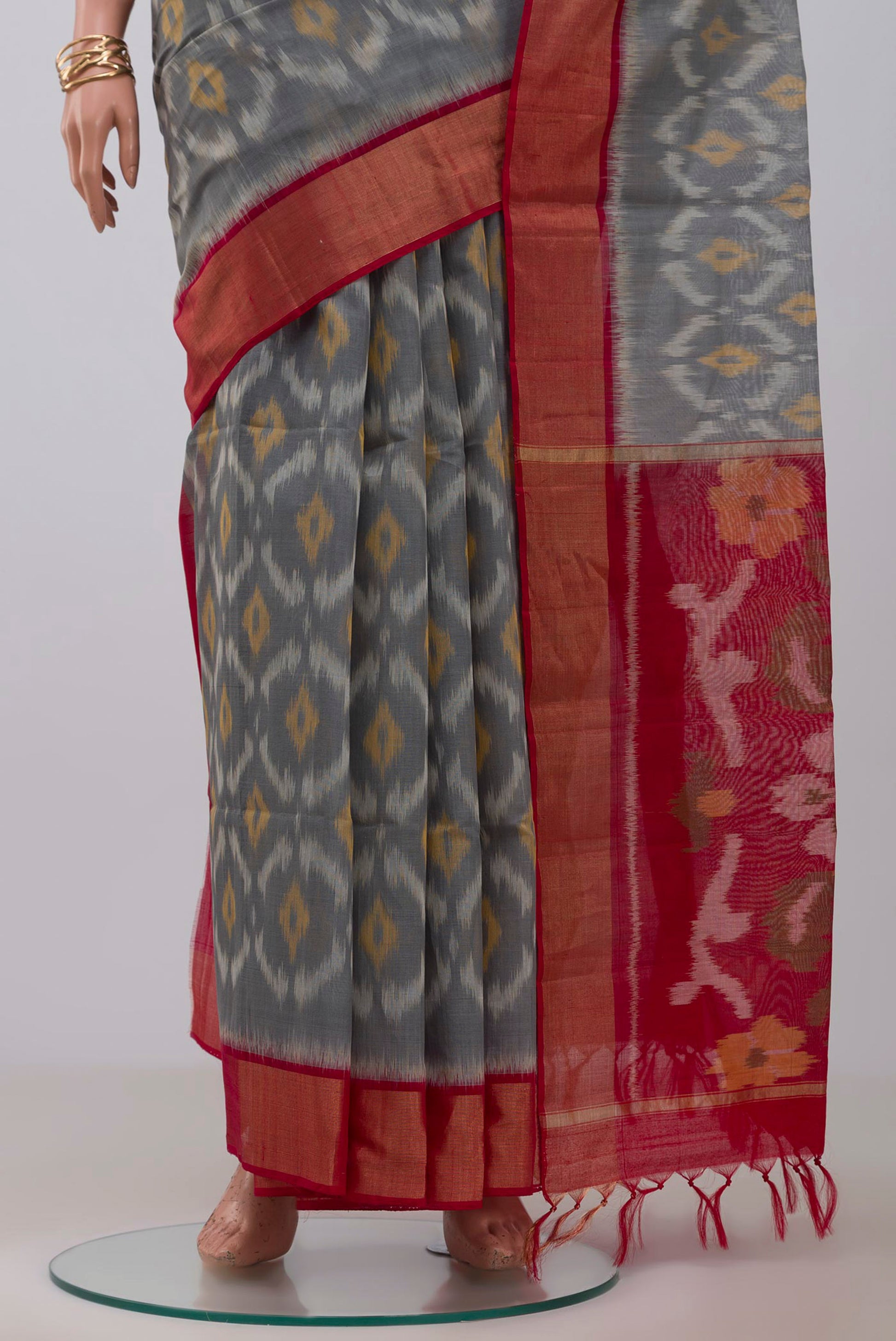Pleats and pallu of Grey Coimbatore Silk Cotton Saree with Ikat design on the body and Zari Border. 