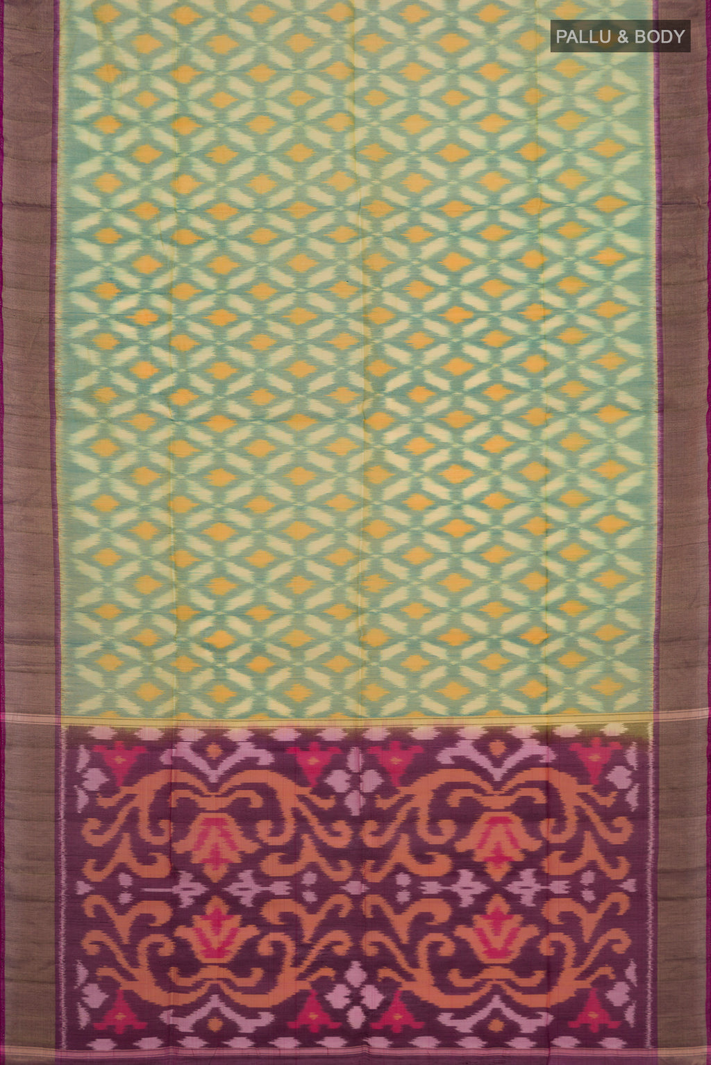 Flat view of Green Silk Cotton Saree with Ikat design on the body and Zari Border. 