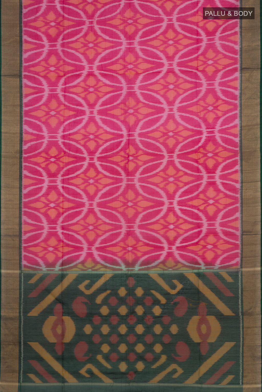 Flat view of Pink Silk Cotton Saree with Ikat design on the body and Zari Border. 