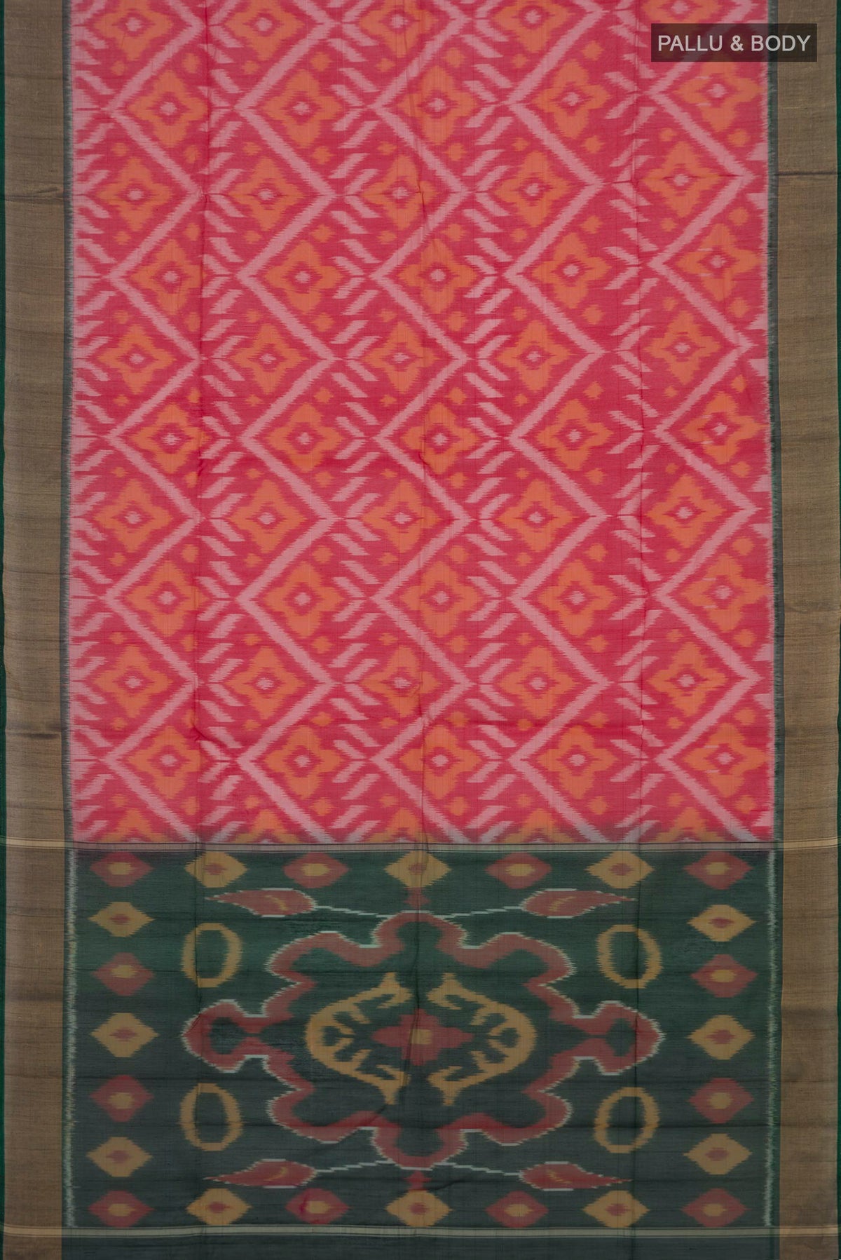Flat view of Red Silk Cotton Saree with Ikat design on the body and Zari Border. 