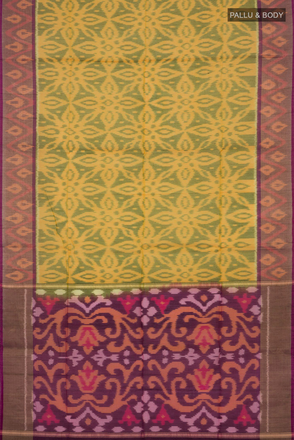 Flat view of Yellow Silk Cotton Saree with Ikat design on the body and Zari Border. 