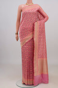 Pure Silk Pink Banarasi Saree with Zari And Thread Butta on the body and Zari Border.  displayed on a mannequin