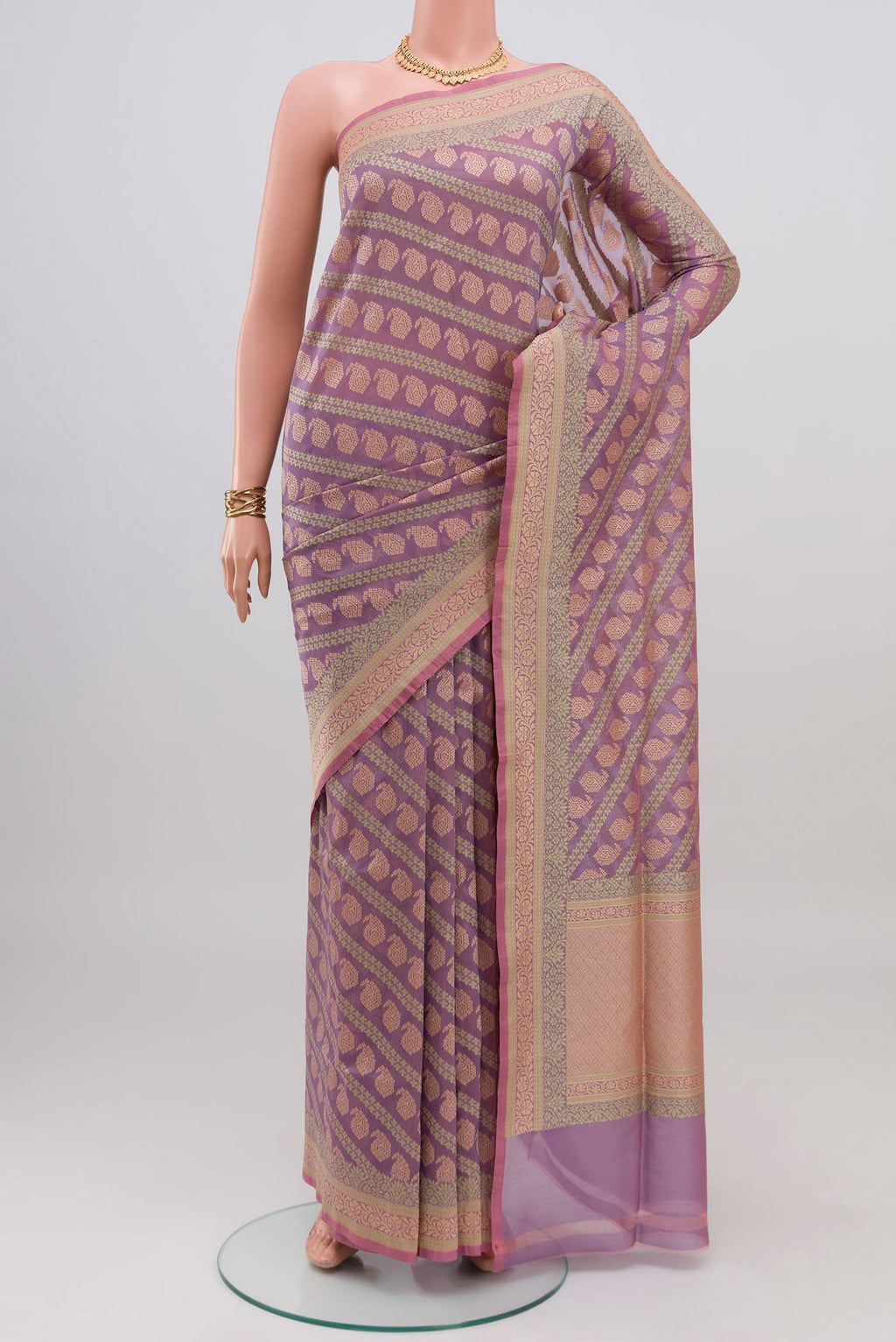 Lavender Banarasi Silk Saree with Zari And Thread Butta on the body and Fancy Border.  displayed on a mannequin