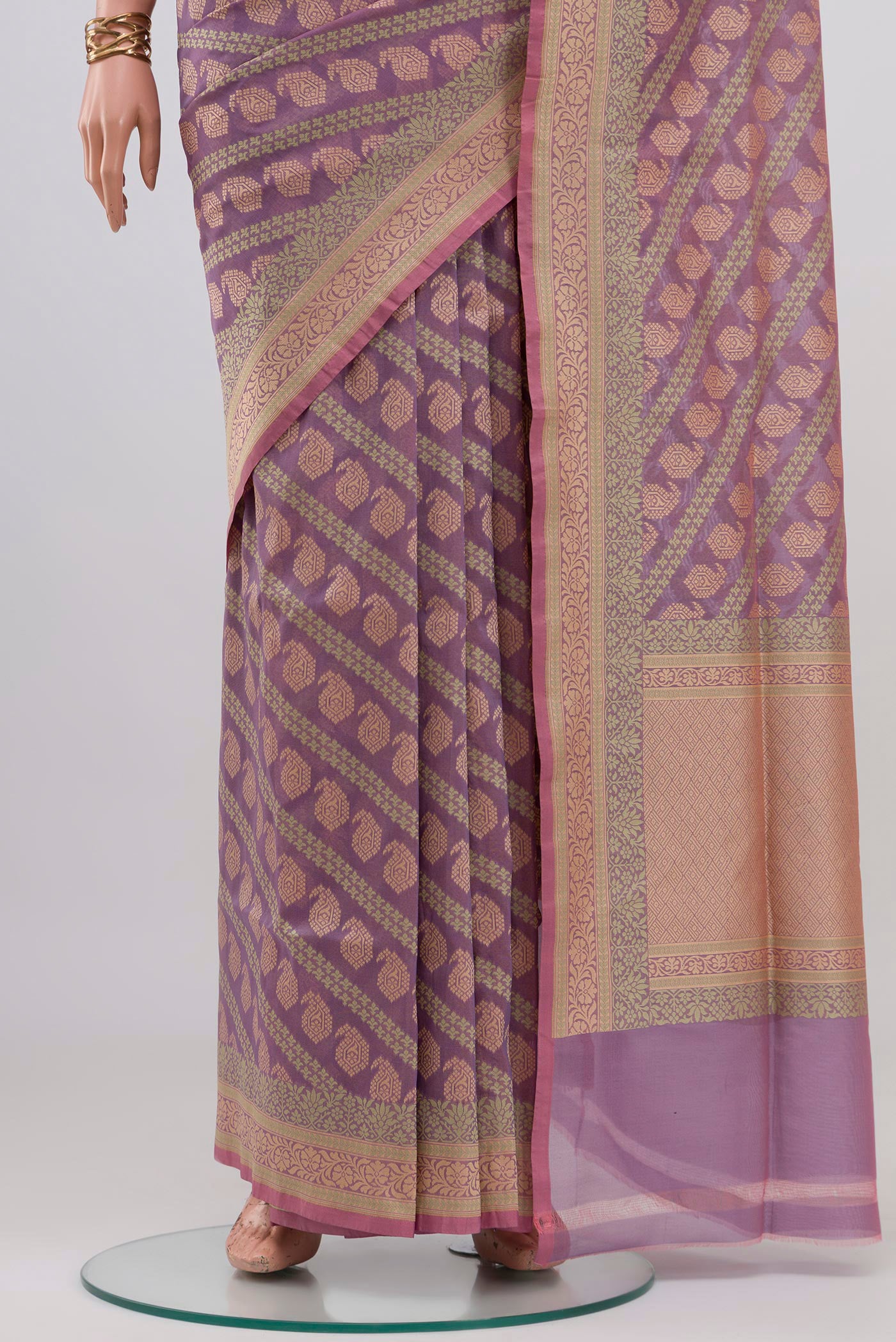 Pleats and pallu of Lavender Banarasi Silk Saree with Zari And Thread Butta on the body and Fancy Border. 