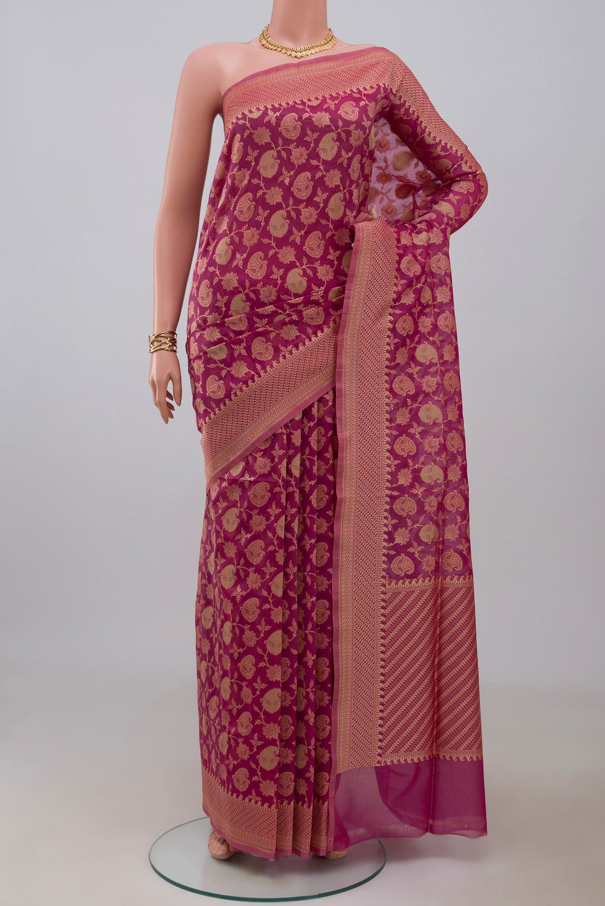 Rani Pink Banarasi Silk Saree with Zari Brocade on the body and Zari Border.  displayed on a mannequin