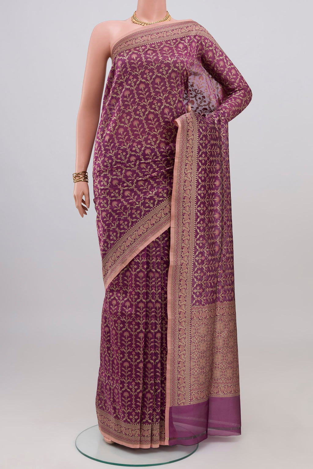 Purple Banarasi Silk Saree with Zari Brocade on the body and Fancy Border.  displayed on a mannequin