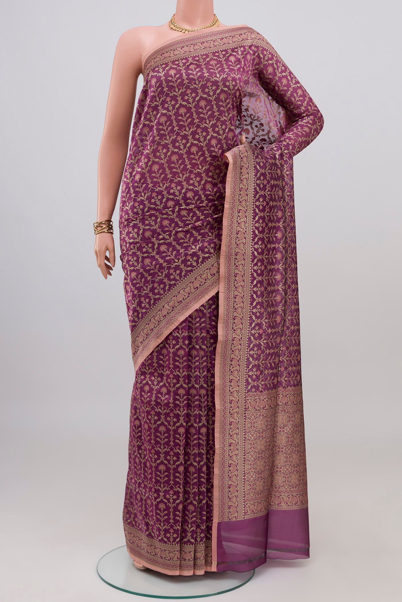 Purple Banarasi Silk Saree with Zari Brocade on the body and Fancy Border.  displayed on a mannequin