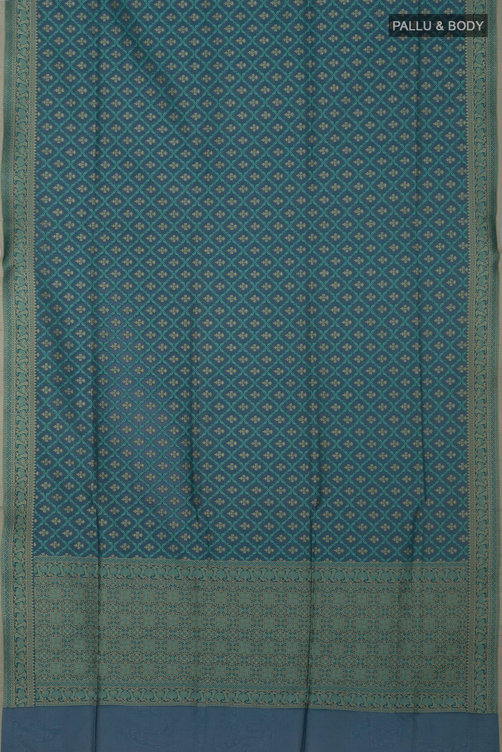 Flat view of Blue Grey Banarasi Silk Saree with Zari And Thread Butta on the body and Zari Border. 