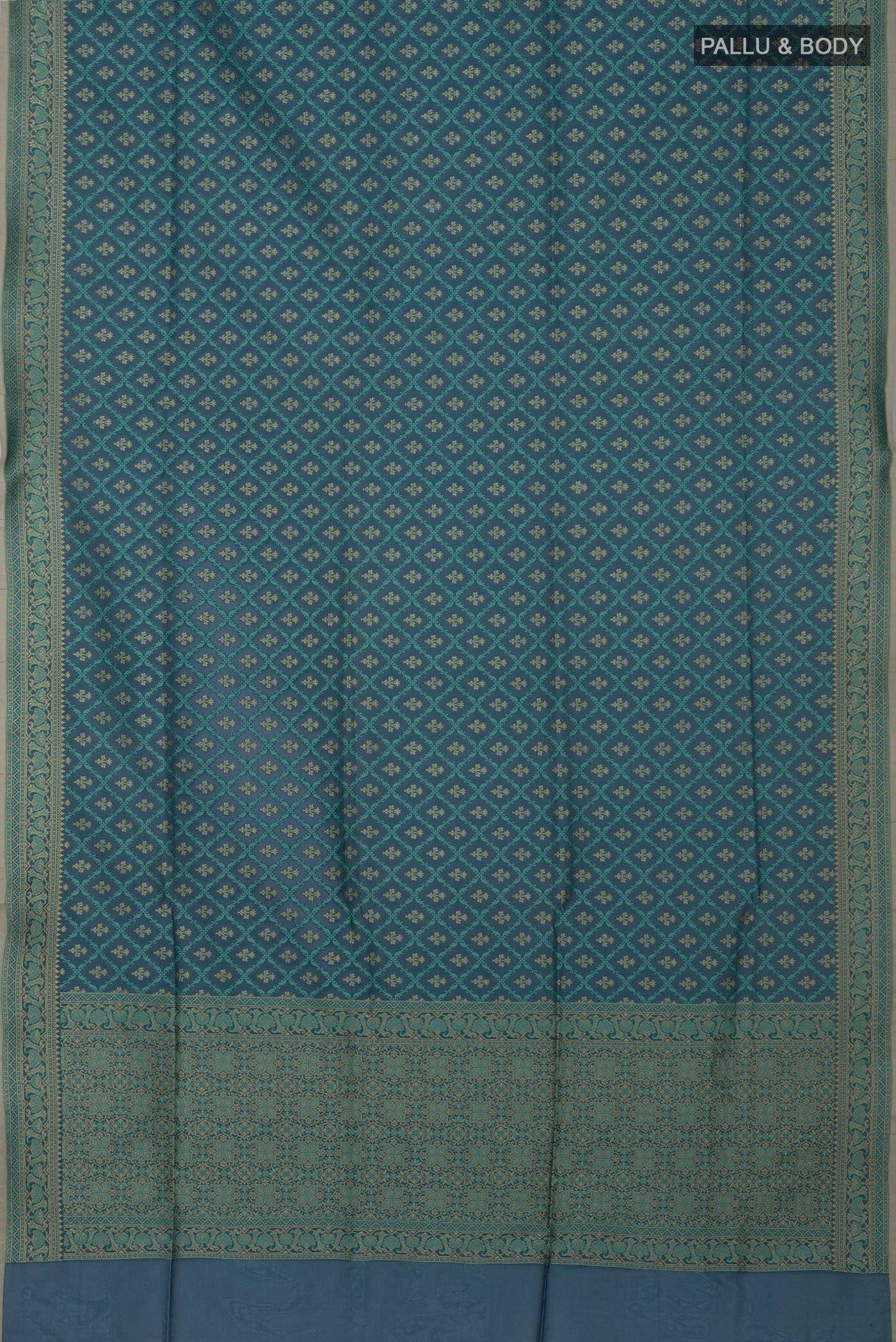 Flat view of Blue Grey Banarasi Silk Saree with Zari And Thread Butta on the body and Zari Border. 