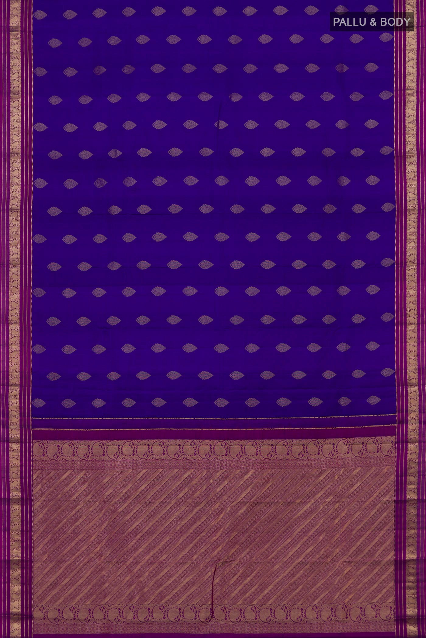 Flat view of Blue Kanchipuram Silk Saree with Zari Butta on the body and Zari Border. 
