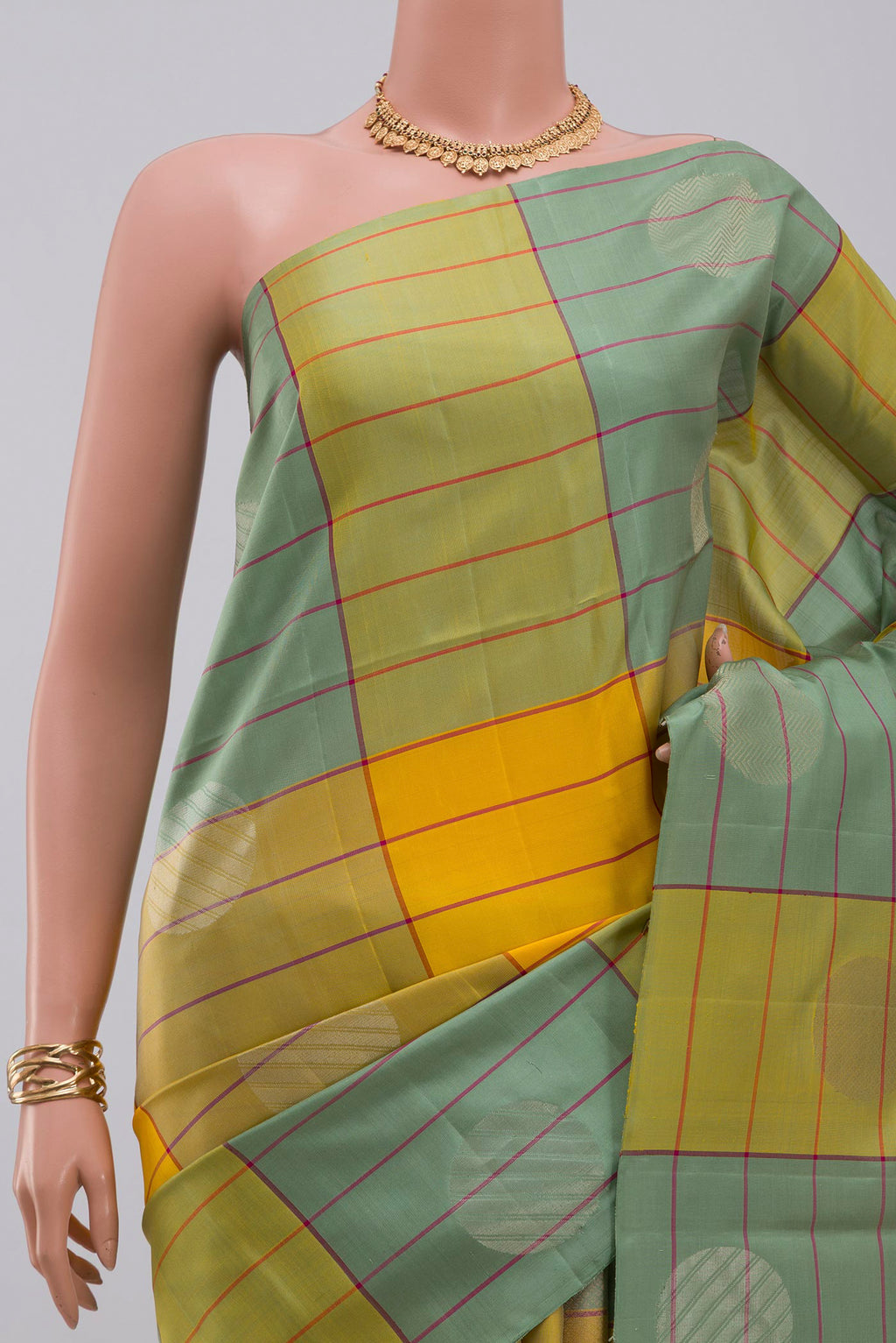 Border image of Multi Color Soft Silk Saree with Checked design on the body and Without Border. 