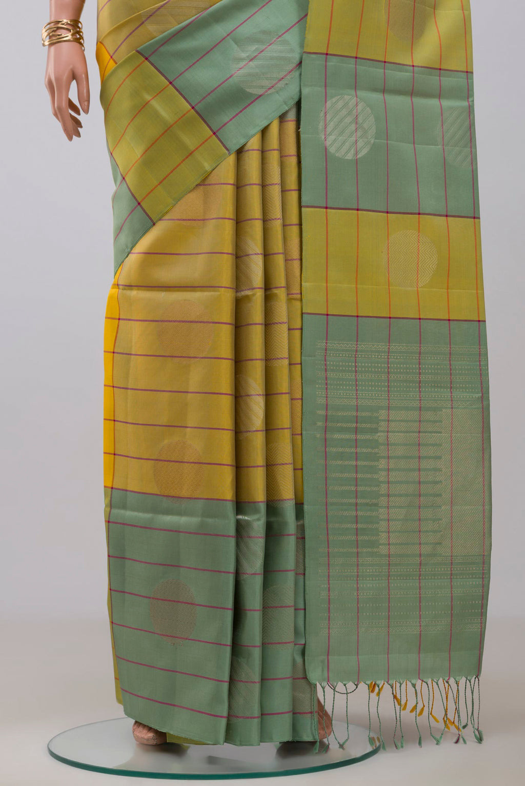 Pleats and pallu of Multi Color Soft Silk Saree with Checked design on the body and Without Border. 