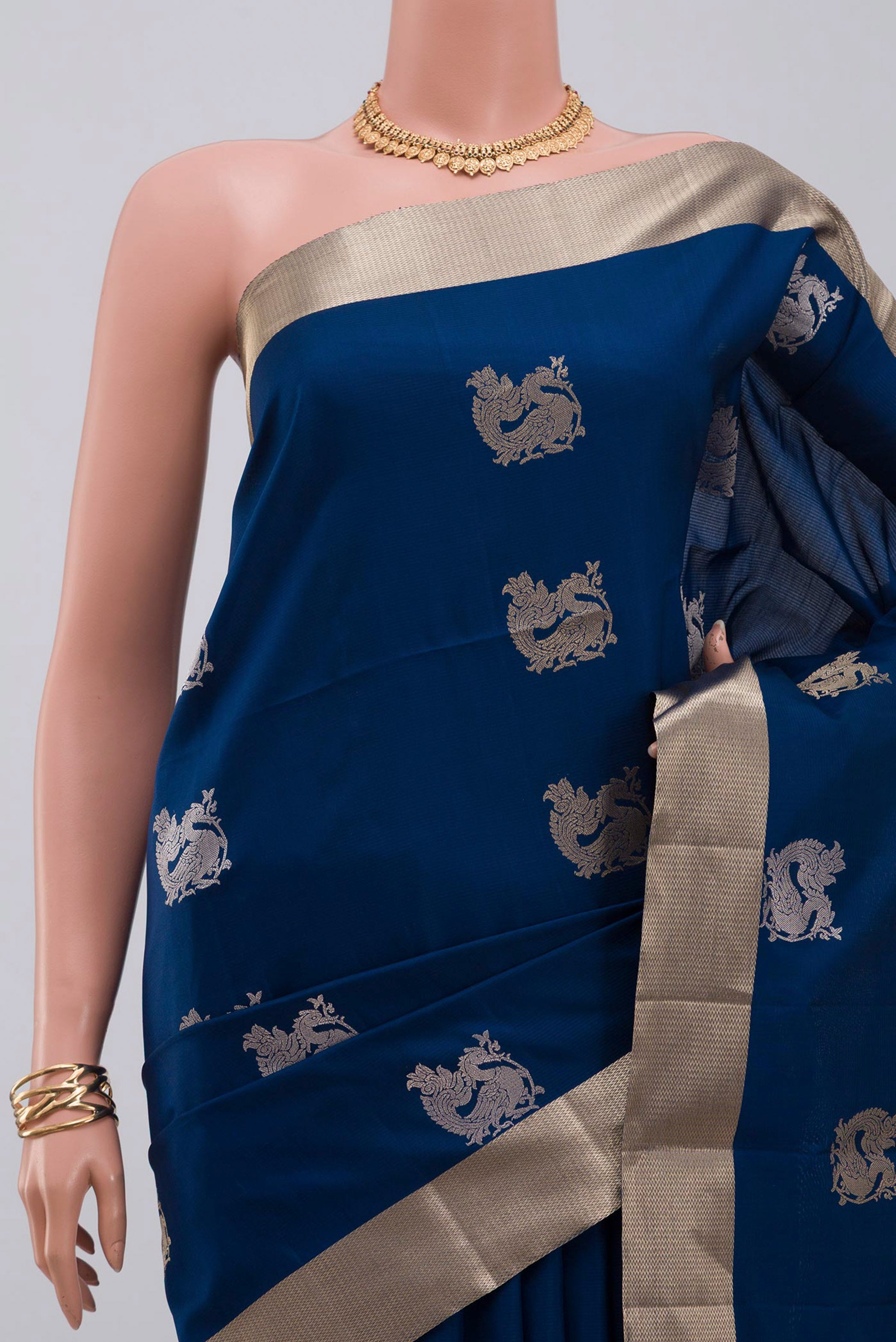 Border image of Blue Soft Silk Saree with Zari Butta on the body and Zari Border. 