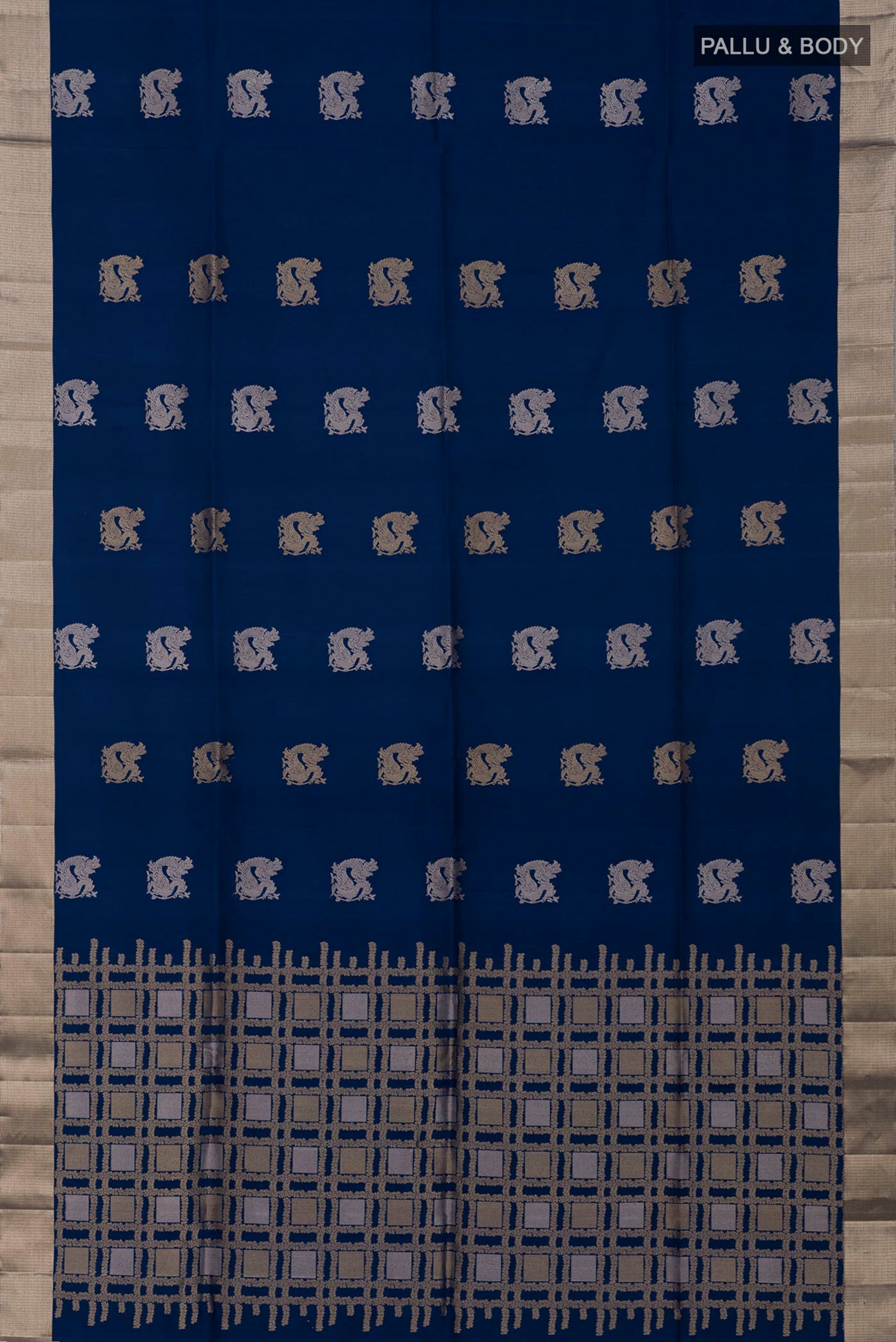Flat view of Blue Soft Silk Saree with Zari Butta on the body and Zari Border. 